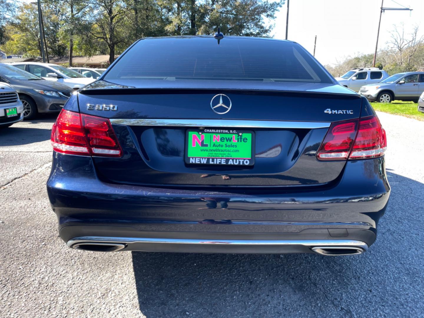 2014 BLUE MERCEDES-BENZ E-CLASS E 350 LUXURY 4MATIC (WDDHF8JB1EB) with an 3.5L engine, Automatic transmission, located at 5103 Dorchester Rd., Charleston, SC, 29418-5607, (843) 767-1122, 36.245171, -115.228050 - Beautiful & Clean Interior with Leather, Sunroof, Navigation, Backup Camera, Push button start, CD/AUX/Sat/Bluetooth, Dual Climate Control, Power Everything (windows, locks, seats, mirrors), Power Rear Sunshade, Heated/Memory Seating, Keyless Entry, Alloy Wheels. Clean CarFax (no accidents reported! - Photo#5